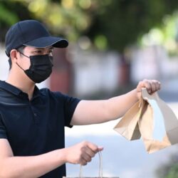 delivery-man-in-protective-mask-delivering-food-to-2021-09-04-12-12-46-utc11 (1)