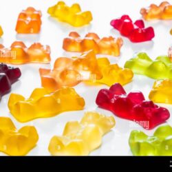 gummy-bear-candy-in-white-backdrop-thd-or-cbd-cannabis-sweets-in-form-of-gelatine-gummi-bears-calming-edible-food-supplements-2EW62CG