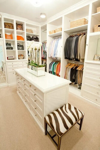 closet-with-island-and-chair-2 closet-with-island-and-chair-2