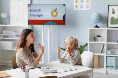woman-doing-speech-therapy-with-little-blonde-boy_11zon (3) woman-doing-speech-therapy-with-little-blonde-boy_11zon (3)