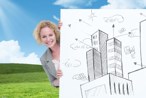 businesswoman-blackboard-with-sketches-buildings_1134-507 businesswoman-blackboard-with-sketches-buildings_1134-507