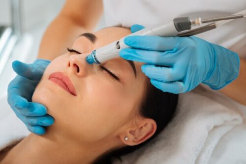 delighted-nice-woman-lying-medical-bed-with-her-eyes-closed-while-having-hydrafacial_259150-9192 delighted-nice-woman-lying-medical-bed-with-her-eyes-closed-while-having-hydrafacial_259150-9192