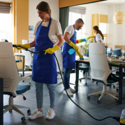 professional-cleaning-service-person-using-vacuum-cleaner-office_23-2150520631