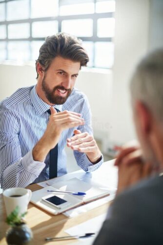 Meeting, male architect and notebook on table with… Meeting, male architect and notebook on table with…