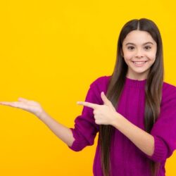 teenager-child-pointing-side-with-finger-present-product-idea-teen-girl-casual-outfit-pointing-empty-space_545934-55185