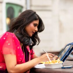 side-view-woman-with-tablet (1)