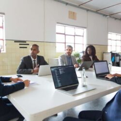 group-analysts-communicating-morning-meeting (1)